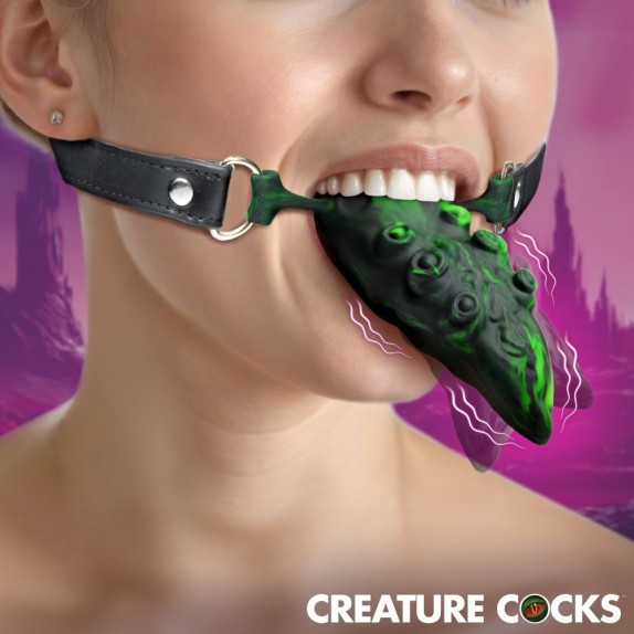 LINGUA VIBRANTE DI DRAGO IN SILICONE CHE LECCA GAG CON CINTURINO