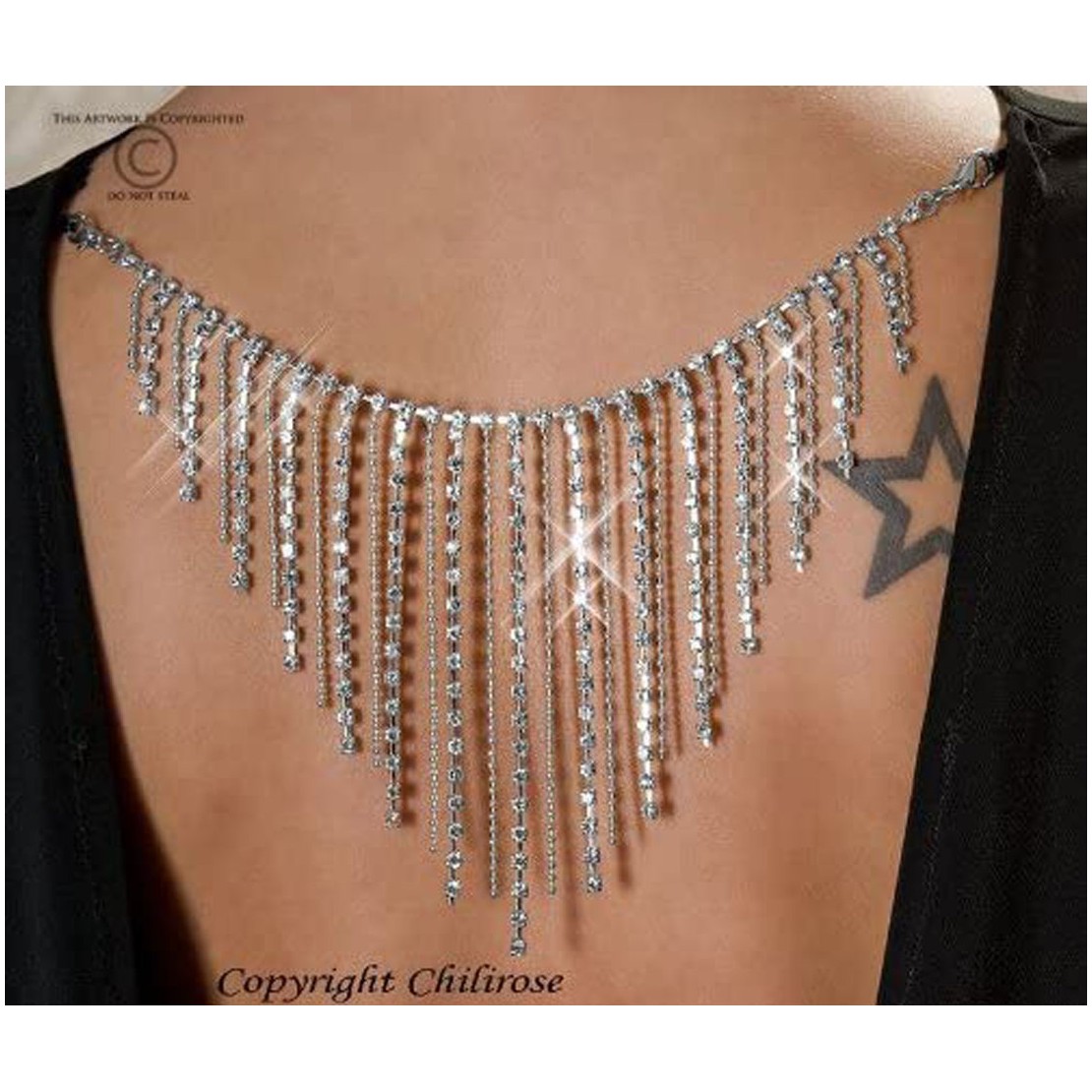 MINIABITO SEXY SCOLLATO SULLA SCHIENA CON STRASS